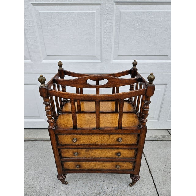 This beautiful walnut and leather Canterbury or side table is by Jonathan Charles and is from their Windsor Collection. It...