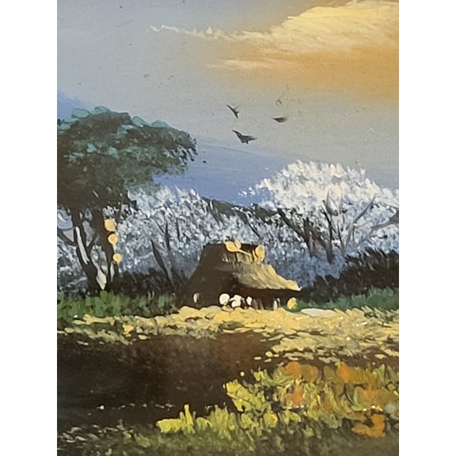 This framed miniature landscape oil painting depicts a cabin in a field, created in the 1980s. The artwork is original and...