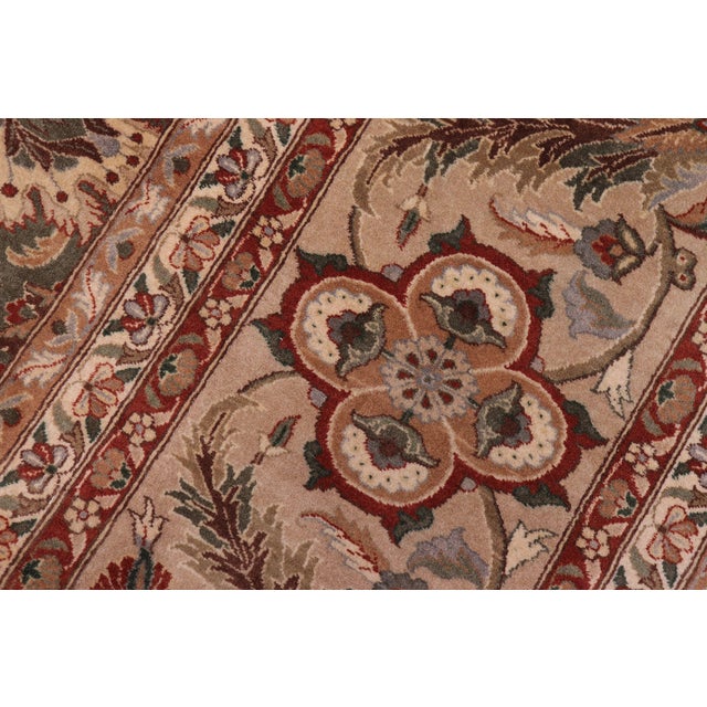 Designed with mesmerizing intricacy and gorgeous color palette, this hand-knotted masterpiece demonstrates the beauty and...