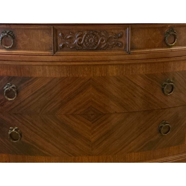 Rich color, its surface protected by custom glass cover. Two spacious lower drawers, single shallow drawer. Brass pulls.
