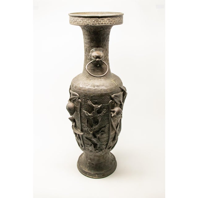 Offering this stunning Chinese spelter vase. Having geometrical patterns all-over, and raised floral detail.