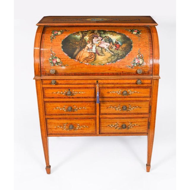 This is a beautiful antique late Victorian Sheraton revival satin wood bureau, circa 1890 in date and hand painted in the...