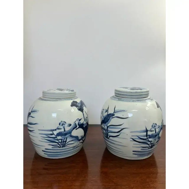 Coastal Pair of Mid 20th Century Blue and White Ginger Jars With Coastal Depictions of Cranes, Water and Shore Grass For Sale - Image 3 of 6