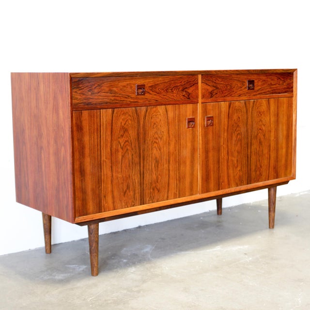 Dimensions: 53 1/8" L x 19 11/16" D x 32 11/16" H Origin: Åbyhøj, Denmark Designer: Erik Brouer Manufacturer: Brouer...