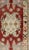 Tribal Vintage Turkish Oushak Rug With Deep Red Field and Soft Green and Peach Accents For Sale - Image 3 of 7