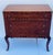Beautiful marquetry inlaid French antique Louis XVI commode with three drawers on cabriole legs, with bronze accents and...