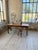 Antique cherry farmhouse table with spindle legs. we love its top, made of two large planks and a small, interlocking...