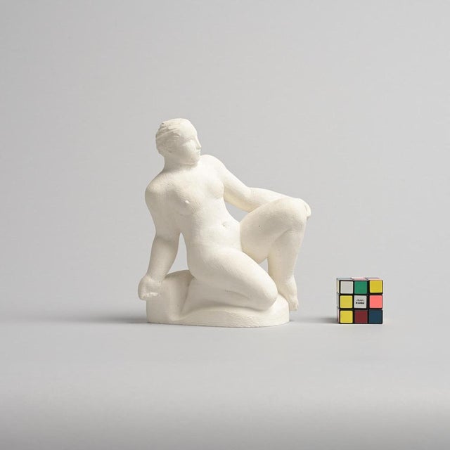 This abstract sculpture in plaster was made by the Belgian artist Jan Keustermans. The sculpture has a rough plaster...