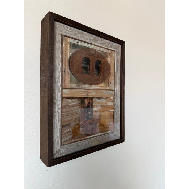 Unique vintage mixed media assemblage wall sculpture by artist James Ridlon, titled Totem. This highly textural and...