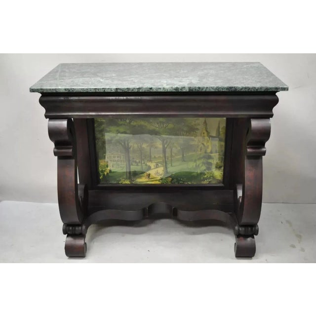 Antique American Empire Mahogany Green Marble Top Console Hall Table. Item features serpentine column supports, art print...