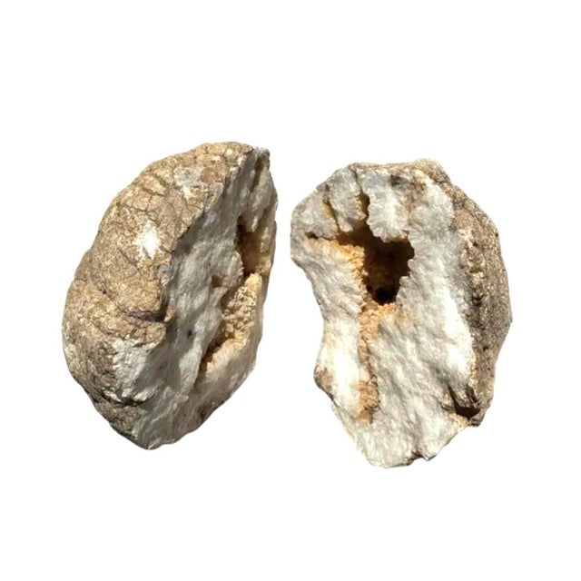 Natural Split-Pair Crystal Geode. This geode has split to reveal a luminous crystalline interior, transforming an...