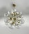 Italian sputnik chandelier with 18 textured balloton Murano glass globes mounted on brass frame in lacquered polished...