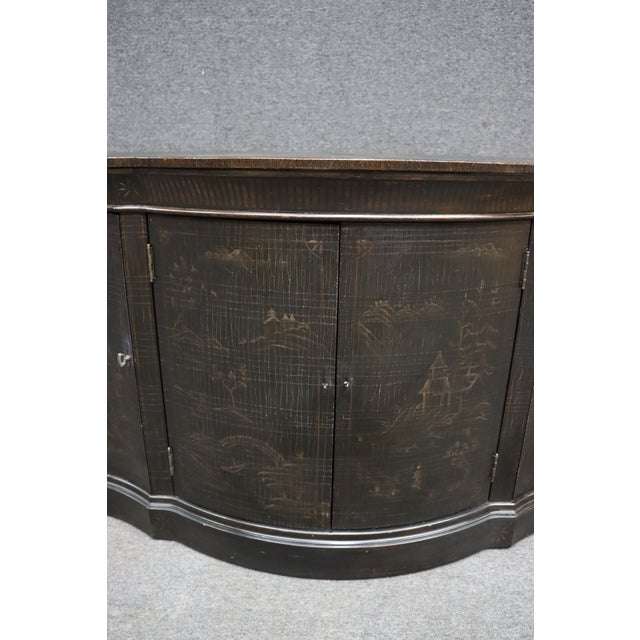 Striking Ethan Allen Chinoiserie console cabinet with a gracefully curved serpentine front, four doors and hand-painted...
