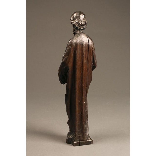 Striking late 18th-century French religious sculpture depicting St. Matthew, hand carved in oak and dating to circa 1780....