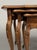 Rad set of three antique French nesting tables. These solid oak beauties, feature iconic, curvy cabriole legs and carved...