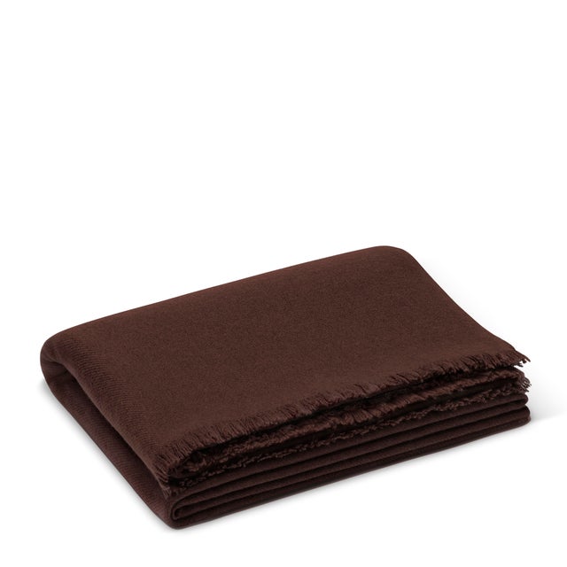 A super-soft cashmere throw in a neutral shade with classic fringe detail that adds a stylish touch layered on sofas and...