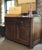 Vintage late 17th century oak buffet with hand-forged metal hardware. Two drawers and two doors, with carved detailing.