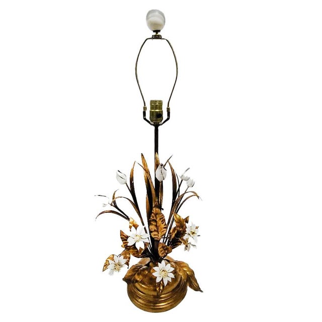 Bring a touch of classic Italian glamour to your space with this stunning mid-20th-century Hollywood Regency table lamp....