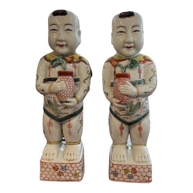 Pair of Late 19th Century Famille Verte Reproduction Porcelain Boys Holding Lotus Flowers For Sale