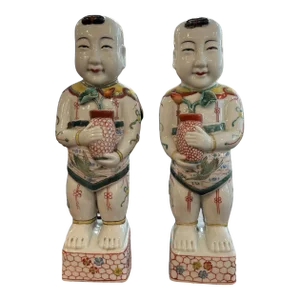 Pair of Late 19th Century Famille Verte Reproduction Porcelain Boys Holding Lotus Flowers