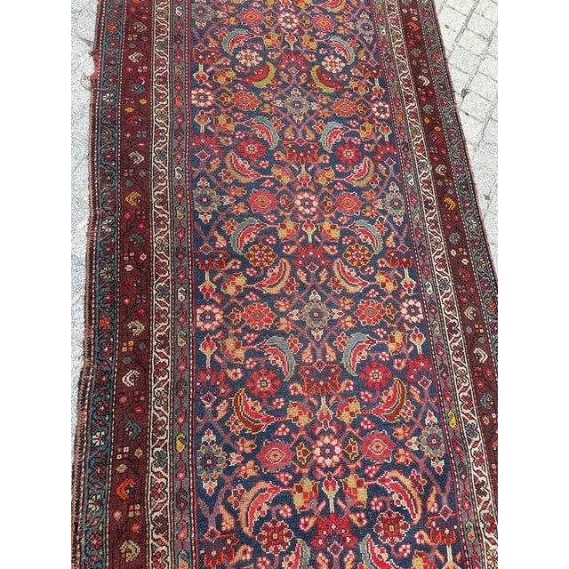 Antique 19th-Century Kurdish Runner Rug A beautiful 19th-century Kurdish handwoven rug, featuring a long, elegant runner...