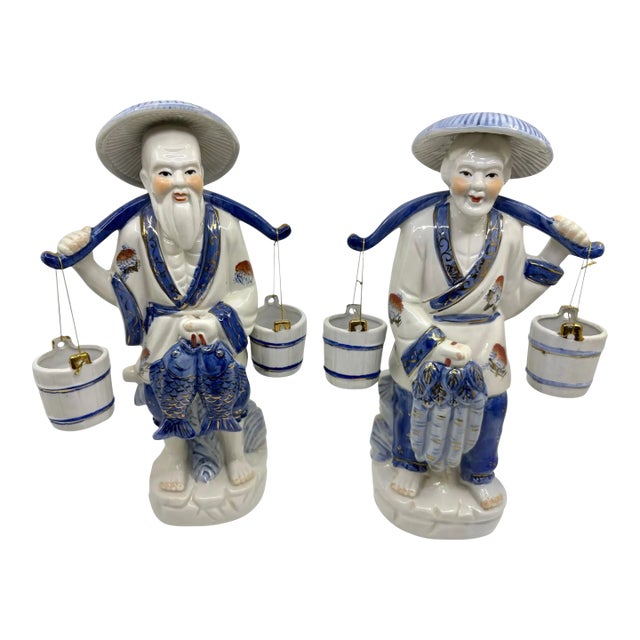 Blue and White Asian Man and Woman Fishing Statues- A Set For Sale