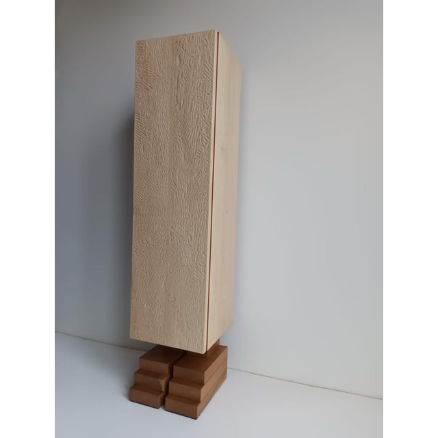 Sculpted Mayan Totem by Pietro Meccani. This sculptural piece is made entirely of larch, cherry, and maple wood. One door...