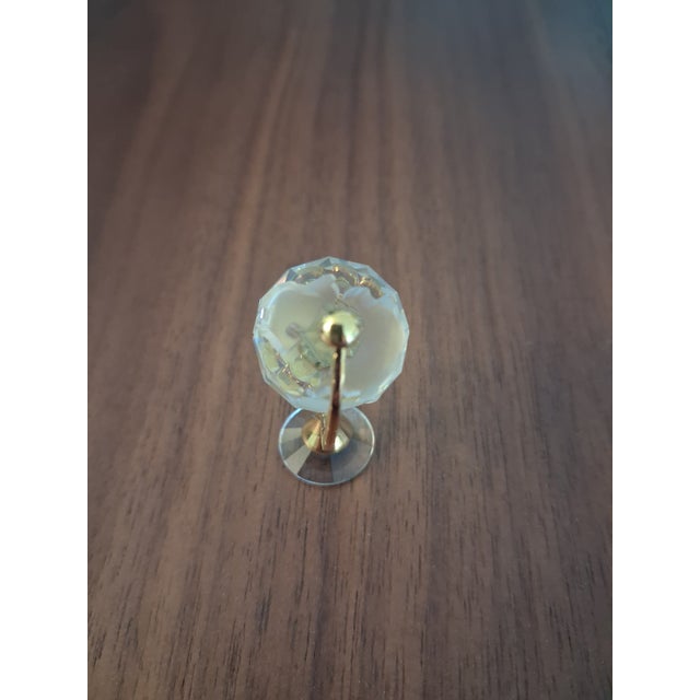 Swarovski Crystal Memories Mini Globe (Gold Accent), item number 199455. Designed by Anton Poppinger, this retired piece...