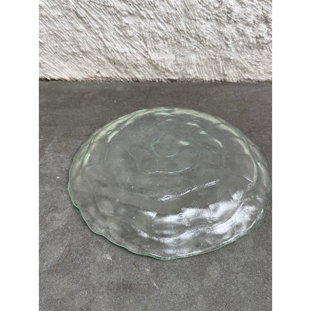 Round texture green glass platter/plate with spiral motif manufactured by the Consolidated Glass Company, USA. The plate...