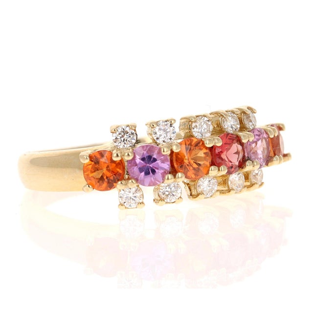1.36 Carat Natural Sapphire and Diamond Yellow Gold Band There are 6 Multicolor Sapphires that weigh 1.10 carats and 10...