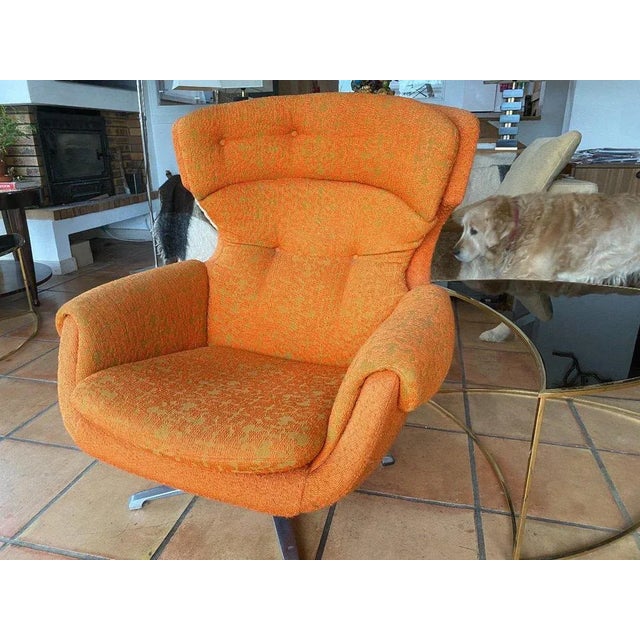 "Pivoting and tilting chair Circa 70". Tilting and swivel armchair on a 4 -branch cast iron is missing a button but very...