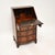 A smart and useful antique Georgian style writing bureau. This was made in England, it dates from around the 1950’s. The...