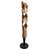 This mahogany wood sculpture features an organic, twisting form with sweeping curves and sculptural openings that...