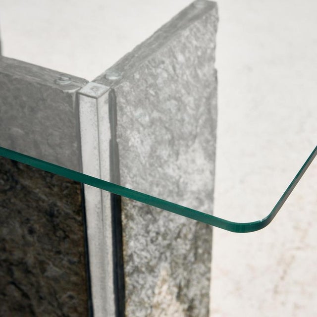 Console table with slate stone legs from the 1980s. Thanks to its design and materials, it is an elegant and timeless...