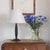 Beautiful Art Nouveau French iron table lamp from the 1920s. Iron body with textured grooves on curvy stem and circular...