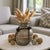Elevate your home décor with this stunning wooden vase, designed to bring warmth and natural elegance to any space. Its...