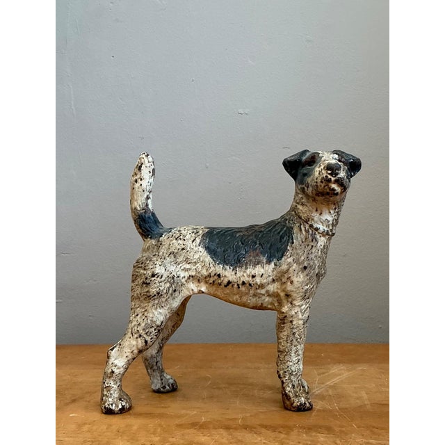 This charming vintage cast iron doorstop captures the spirited character of a Jack Russell Terrier with remarkable...