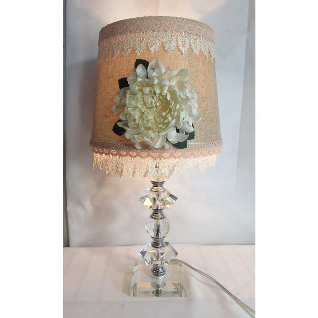 This is not an acrylic lamp. It is glass . The shabby chic lamp and shade are sweet together. Sort of romantic Victorian...