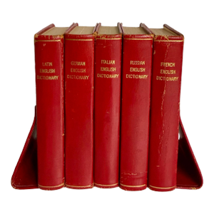 1958 Mark Cross Red Leather Multilingual Translation Dictionaries With Matching Book Holder
