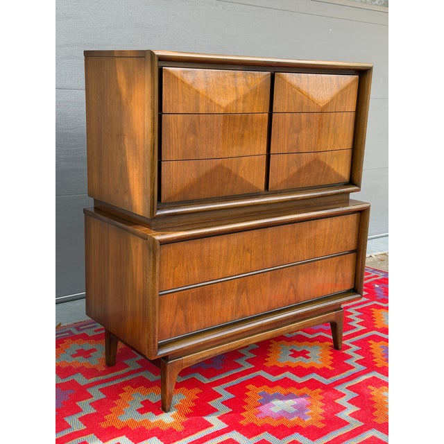Striking mid-century modern gentleman’s chest by United Furniture Co.,Attributed, featuring the iconic diamond sculpted...