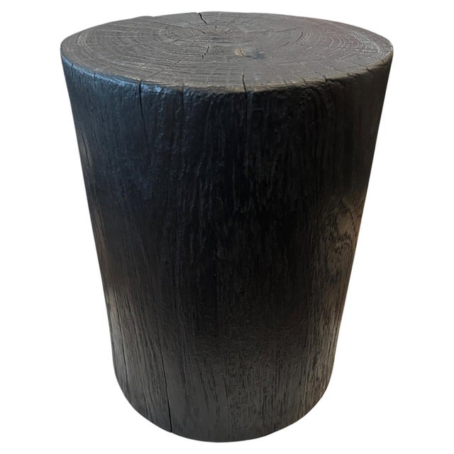Reclaimed teak wood cylinder side table or stool. Charred sanded and sealed and carved into a minimalist cylinder whilst...