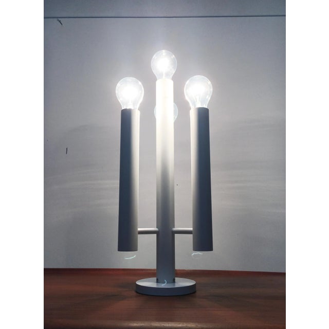 This is a rare table lamp from the Swiss manufacturer Temde. It is both a functional light source and a very decorative...