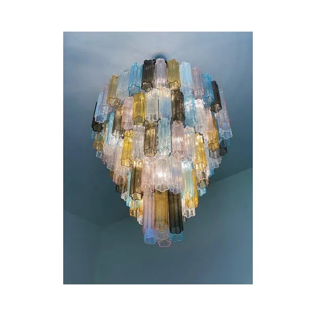 Huge multicolor murano glass “tronchi”chandelier. 5levels of opalino "tronchi" murano glass: amber, fumè, light-blue and...