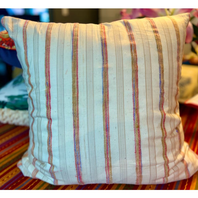 A unique decorative pillow that blends timeless elegance with texture. The front features a natural linen background with...