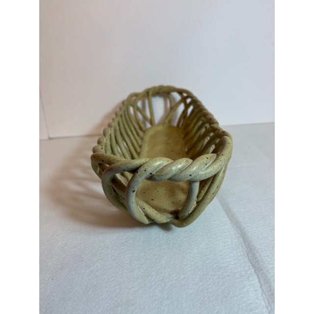 Add a touch of organic texture to your kitchen counter or dining tablespace with this beautiful vintage ceramic...
