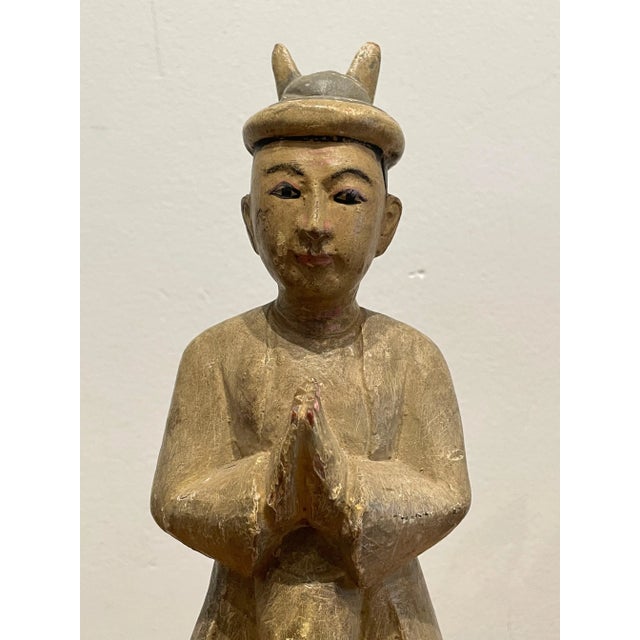Antique Hand-Carved Wooden Figurine of Burmese Monk/Devotee. Carved from a single piece of wood. Paint still present on...