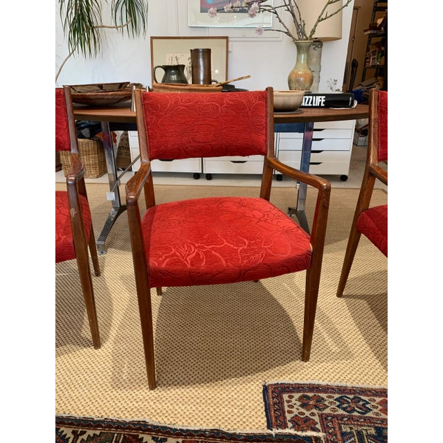 Set of 4 Mid-century dining chairs upholstered in red velvet with embossed cherry blossom design. Beautifully constructed...