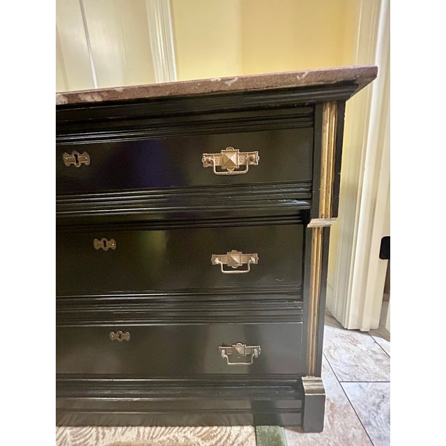 Wood Vintage, Ebonized Wood Commode, Featuring a Marble Top, Three Drawers, Gilded Bronze Mounts, and Gilded Accents on Pilasters, in the Style of Eastlake For Sale - Image 7 of 10