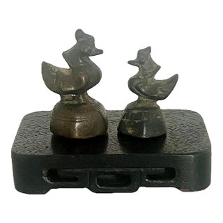 Antique South East Asian Bird Style Opium Weights, a Pair With Carved Wood Stand For Sale