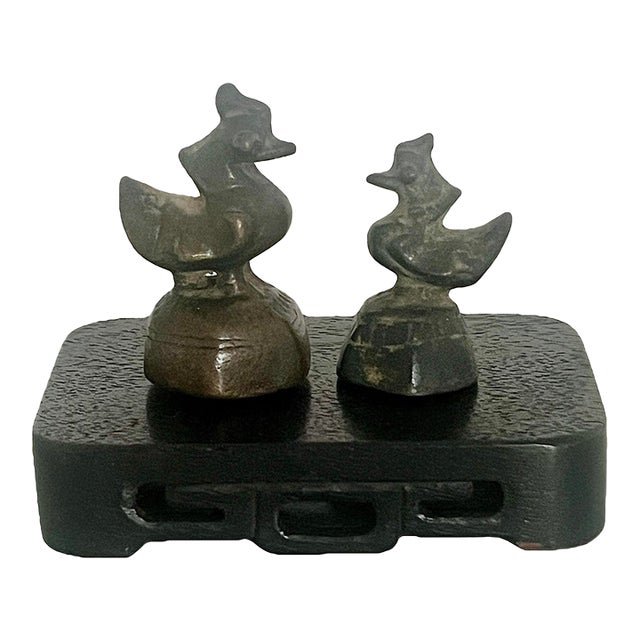 Antique South East Asian Bird Style Opium Weights, a Pair With Carved Wood Stand For Sale